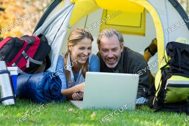 도보 여행자,모험,숲,랩탑,사랑,couple,relationship,countryside,forest,park,grass,casual clothing,blonde,lying,looking,smiling,happy,cheerful,using laptop,laptop,notebook,computer,electronic,touching,browsing,internet,wireless technology,communication,connection,rucksack,rolledup,travel bed,thermos,tent,picnic,camping,camp,vacation,recreation,hiker,adventure,adventurer,travel,exploration,trip,tourism,journey,lifestyle,escapism,romance,romantic,closeness,love,bonding,together,fun,enjoyment,protection,1781432413
